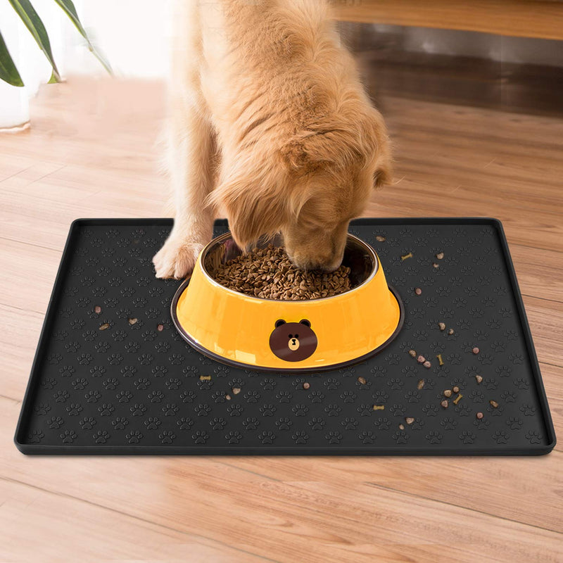 [Australia] - Coomazy Dog & Cat Food Mat, M (19"x12") L (24"x16") Silicone Waterproof Pet Feeding Bowl Dish Placement Tray with Raised Edges to Stop Cat Food Spills and Water Messes Out to Floor 19x12in Black 